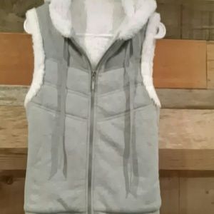 Grey vest with plush white lining